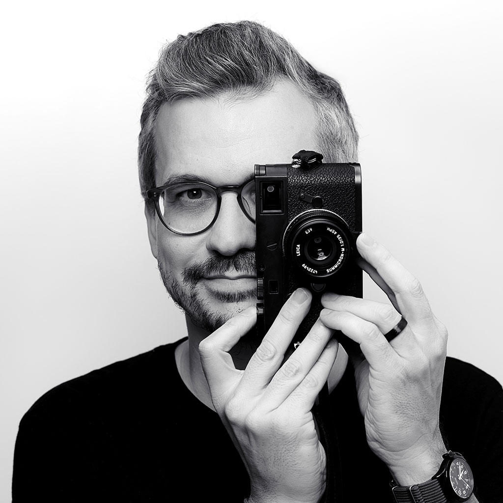 Photo of Florian with a camera covering his left eye