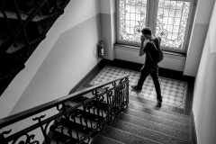 A man walking down a staircase