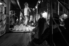 A kid and his/her dad enjoying some live music