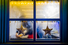 Fogged up window with two stars