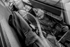 Lumi sleeping in the car, photo taken through the window