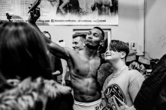 Wrestler Francis Kaspin takes a selfie with a fan