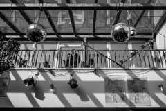 The balcony from below with the two mirror balls
