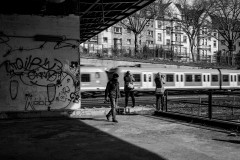 Photographers taking photos of a train passing by