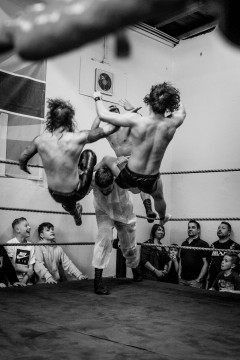 Sequence 5 of 5: Wrestler Matthias Bernstein is about to powerbomb his opponents Maggot and Prince Ahura