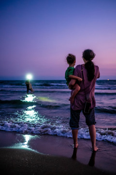 Lumi & Ulya watching a fisherman during sunset at Burnaz beach