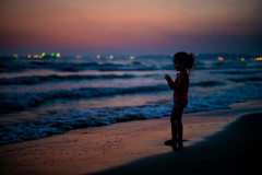 On the beach during sunset