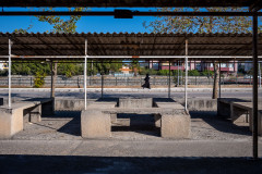 A pedestrian passes by the market area