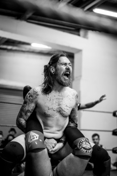 Danny Fray applying a Boston Crab to his opponent