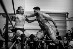 Danny Fray getting slapped in the chest by Joshua Amaru