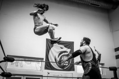 Max Peach hits The Alpha of the Sahara with a Dropkick from the top rope