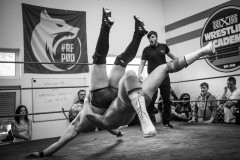 Tibo Hendrik with a Belly-to-back suplex on Jacob Crane