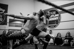 Danny Fray clotheslines Alex Duke and Don Sheen