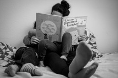 My wife and kids reading a book called 