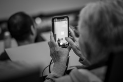 An attendee scans a QR code during Nico Martin’s talk at WordCamp Switzerland 2023