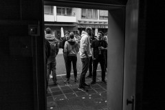Attendees are talking outside the venue during a break at border:none 2023 in Nuremberg