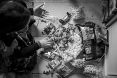 My daughter examins the sweets she gathered during the carnival parade