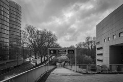 The entry to the subway is closed, the electronic sign above announcing the strike, part of the EON building is seen on the left, Messe Essen to the right